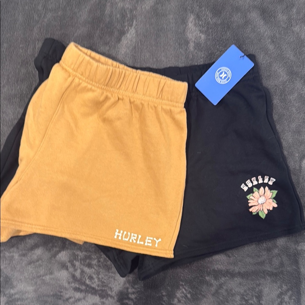 2 pairs of Hurley Athletic Shorts- one tan, one black